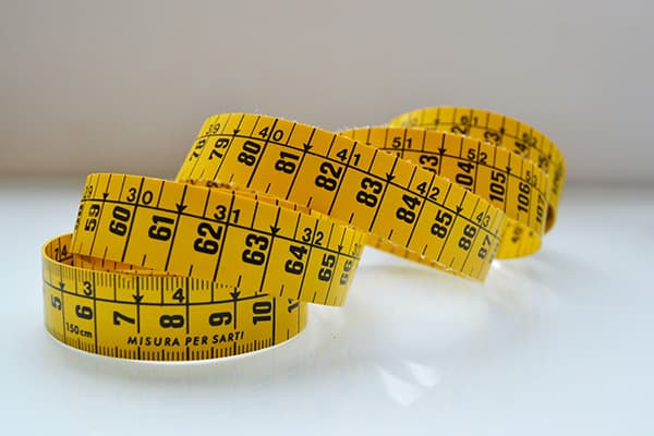 Measuring tape showing cm to feet and inches